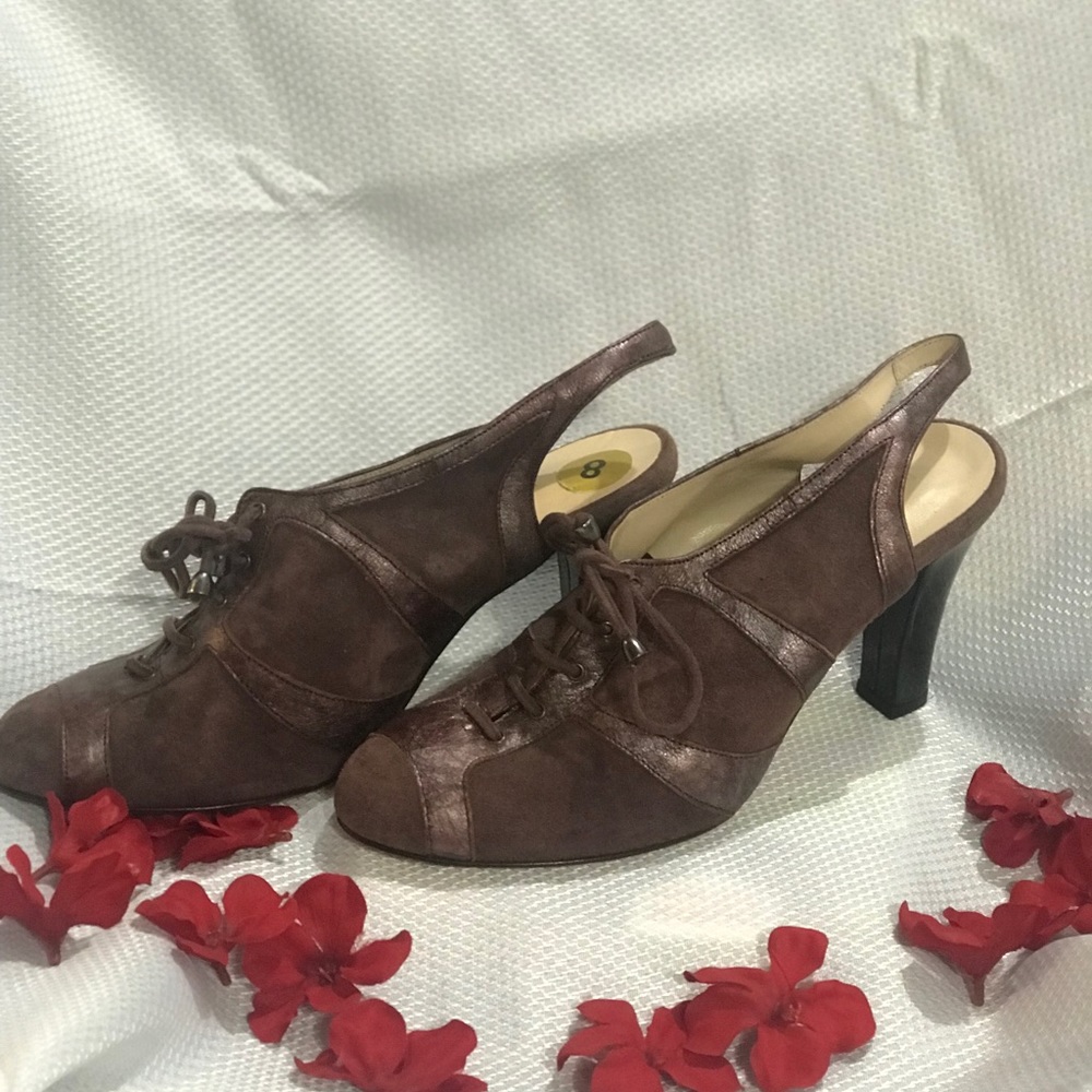 Women’s size 8 open back heels.